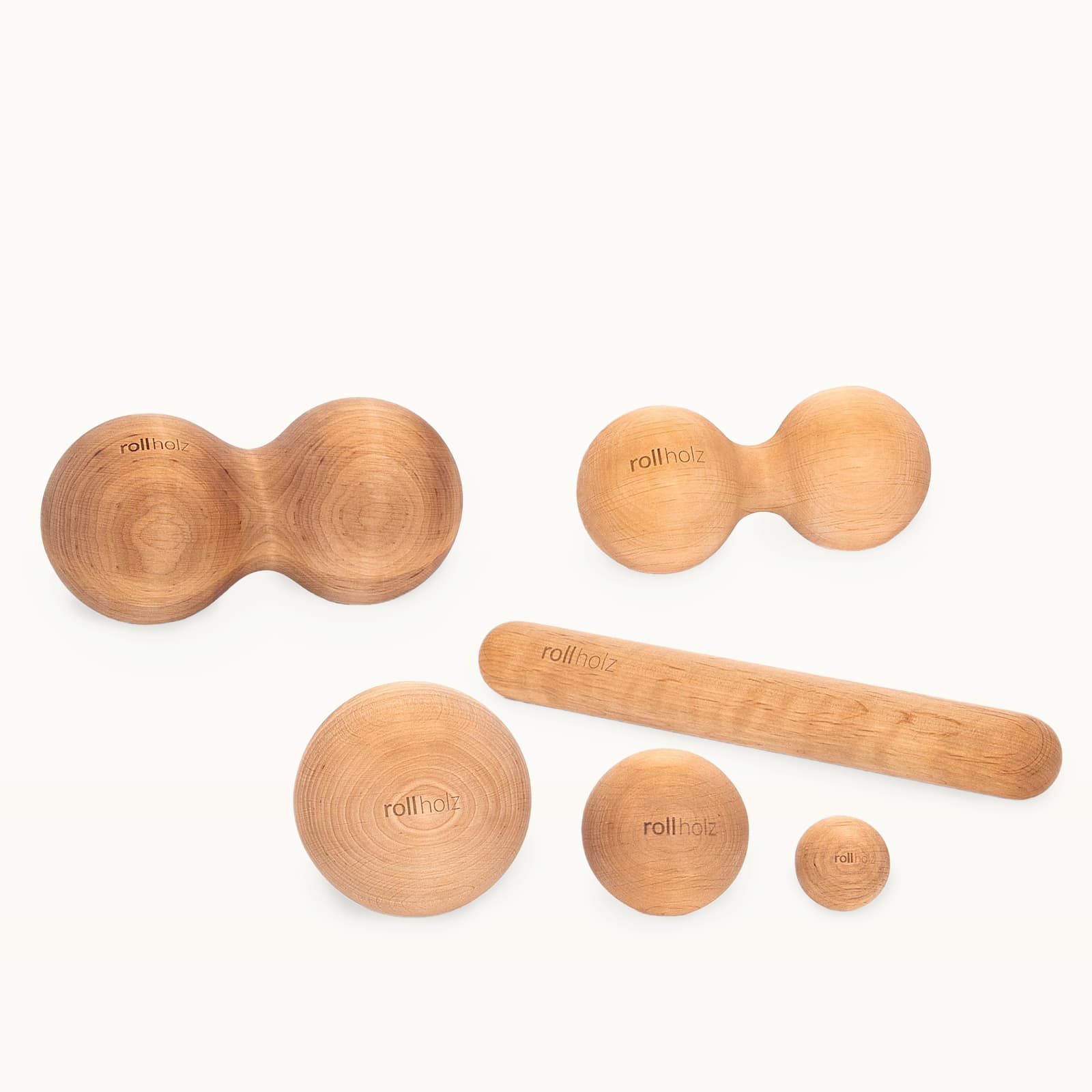 #Holz_Erle Freigestelltes rollholz Faszien-Set aus weichem Erlenholz, ideal für Einsteiger zur sanften Massage von Verspannungen.