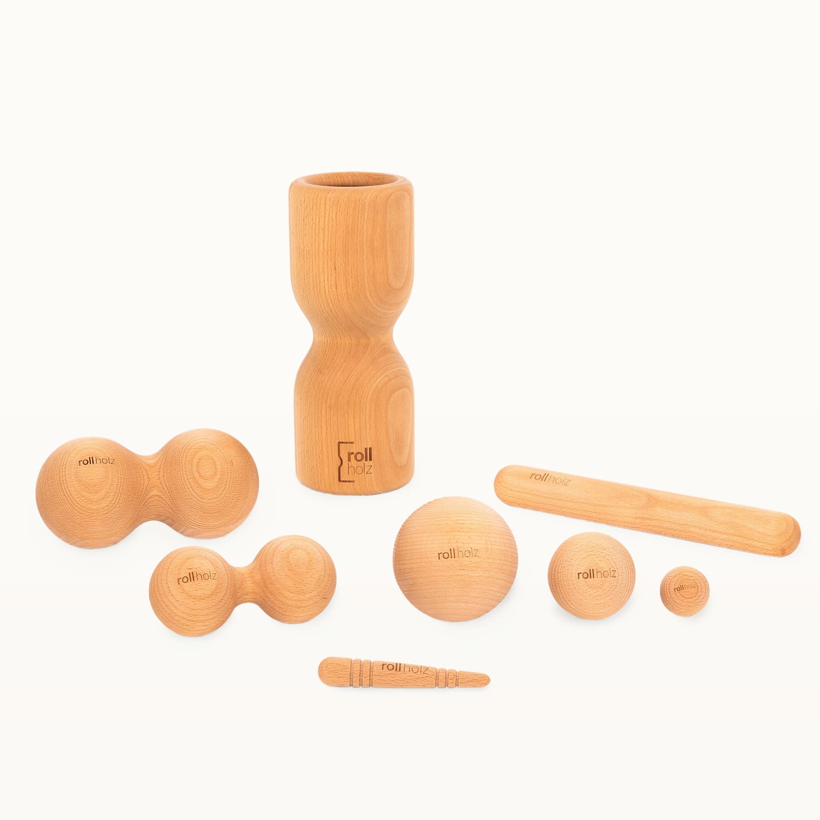 #Holz_Buche Großes rollholz Faszien-Set aus massivem Buchenholz mit verschiedenen Massage-Tools für Training und Regeneration.
